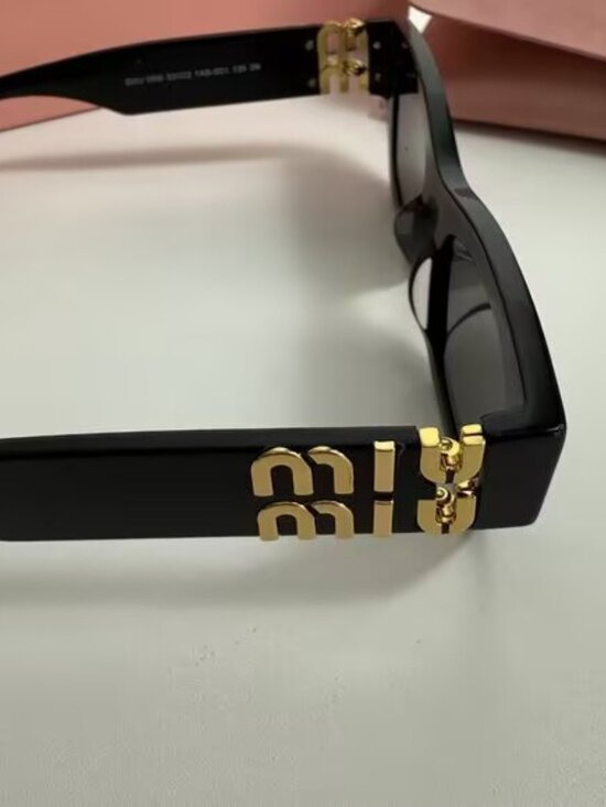 Miu Miu Black Rectangular Sunglasses with Gold Accents